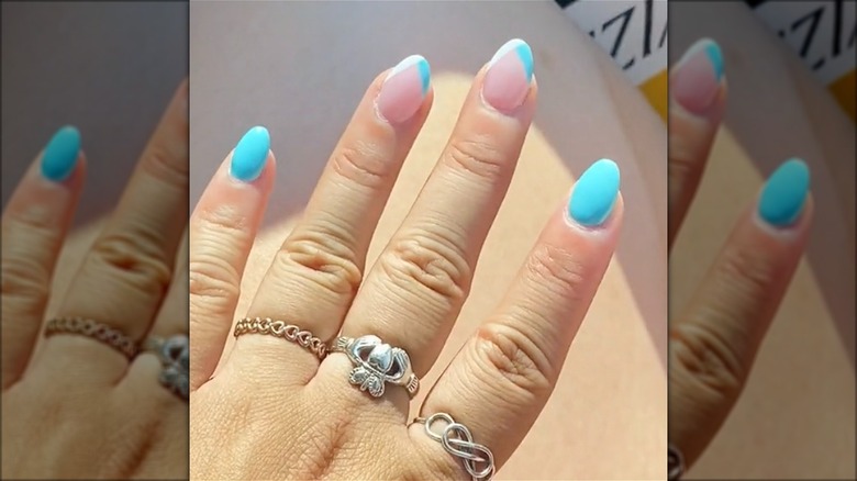 Tiffany blue, clear, and white nails