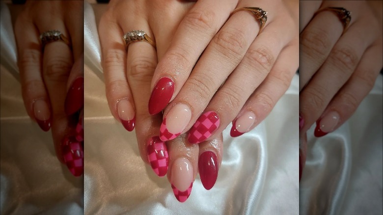 woman with checkerboard french tip nails