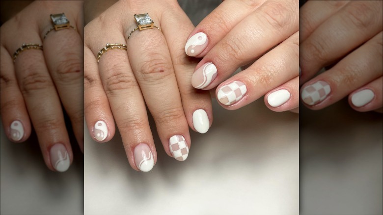 woman with neutral checkered nails