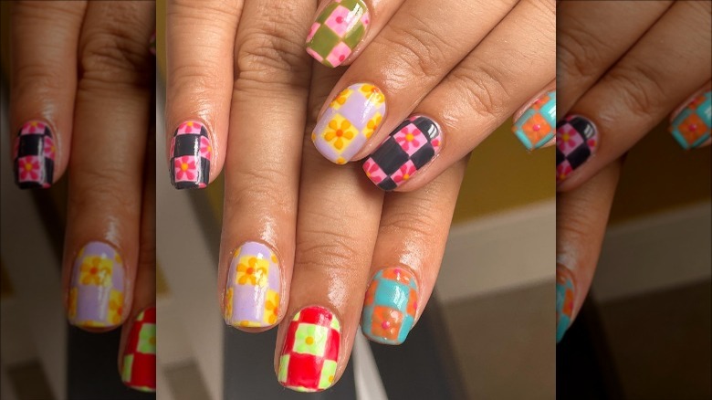 woman with flower checkered nails