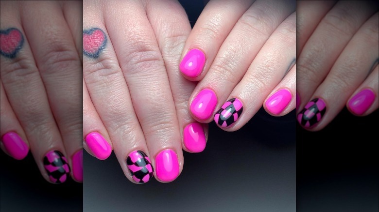 woman with wavy checkered nails