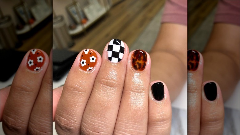 woman with black white checkered nail