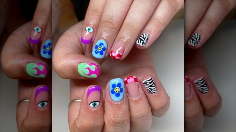 woman with colorful checkered tip nails