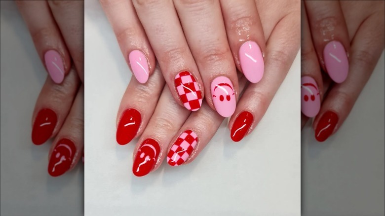 woman with red and pink checkered nails