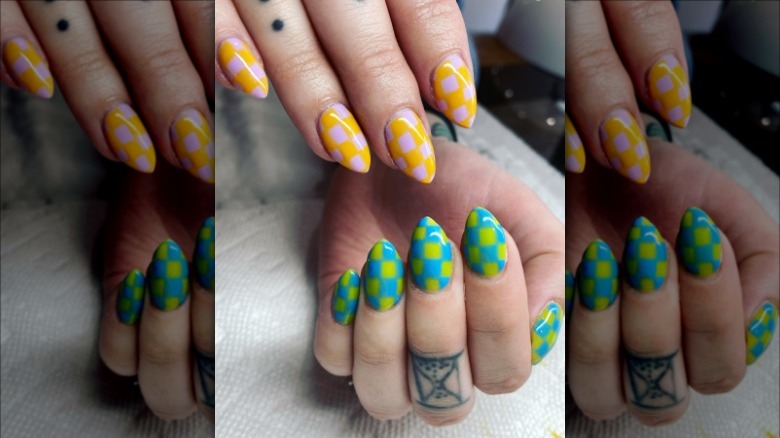 woman with colorful checkered nails