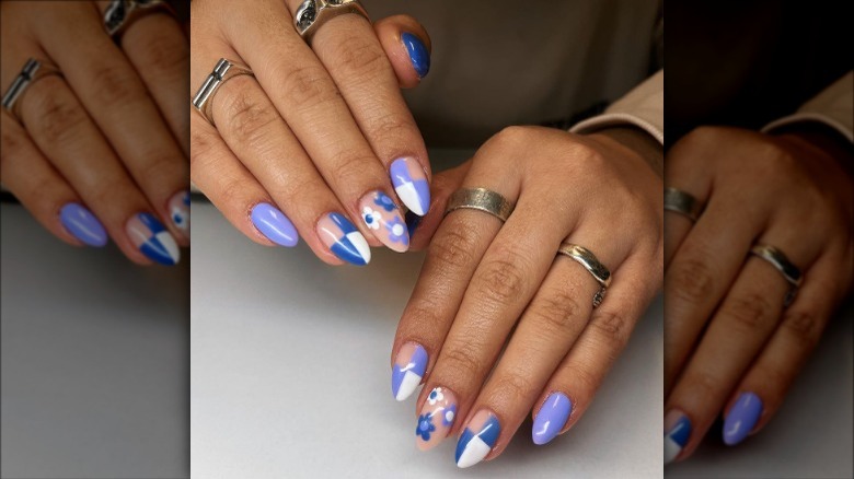 woman with blue white beige colorful checkered nails