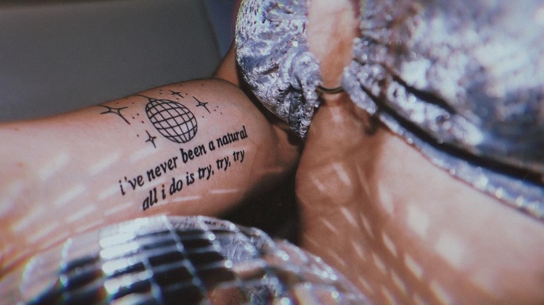 Mirrorball lyric tattoo