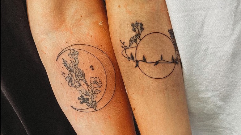 Moon and saturn pair tattoo