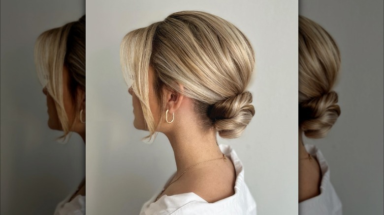 Chignon with side-swept bang