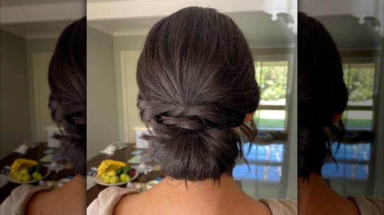 Tucked chignon with small twists 