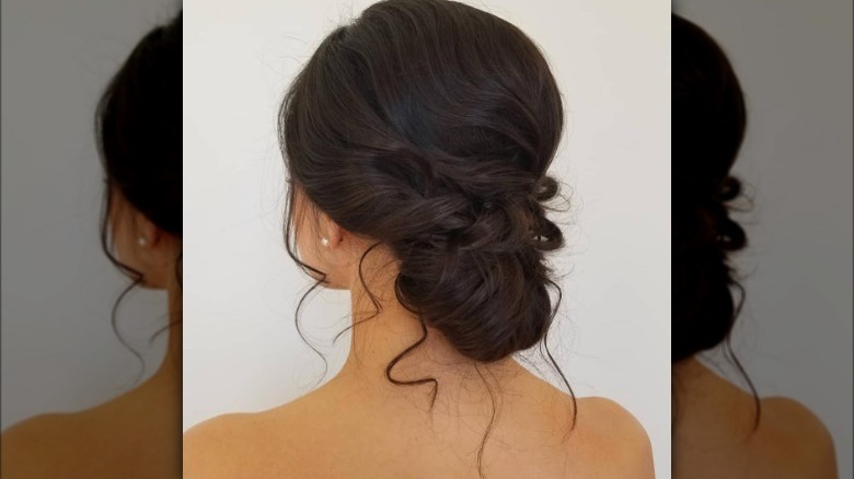 Wispy chignon bridal hairstyle