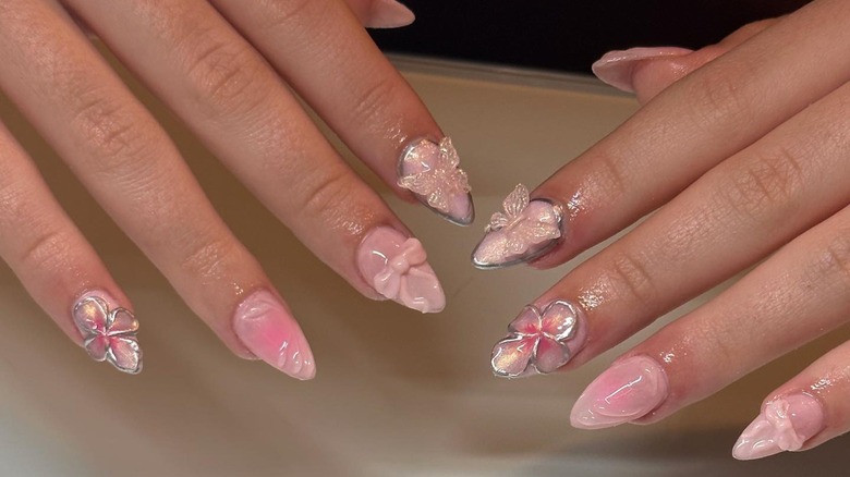 Pink nails with 3D chrome designs
