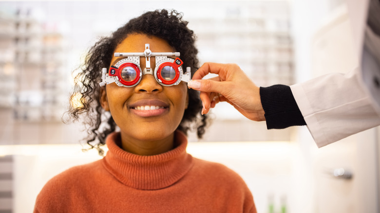 A woman getting her eyes checked