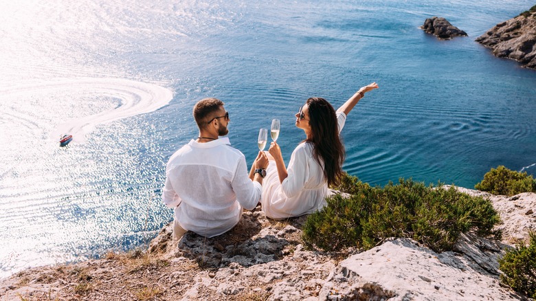 Couple vacationing by water