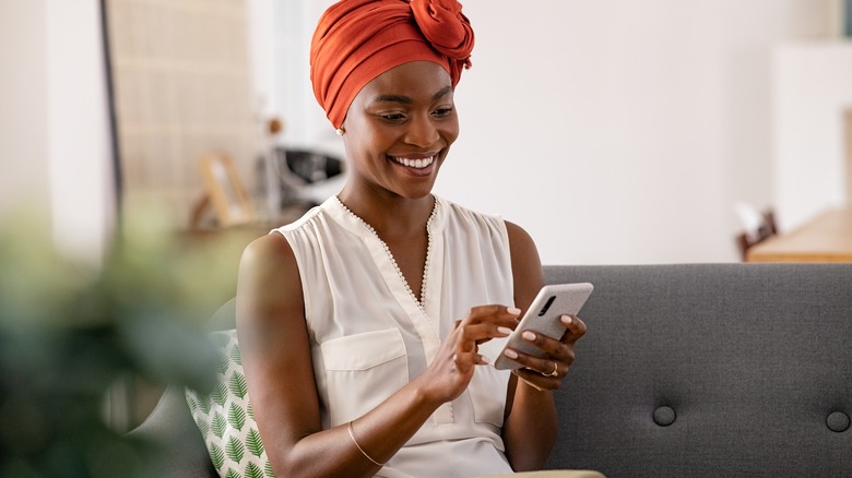 Woman texting on her smart phone