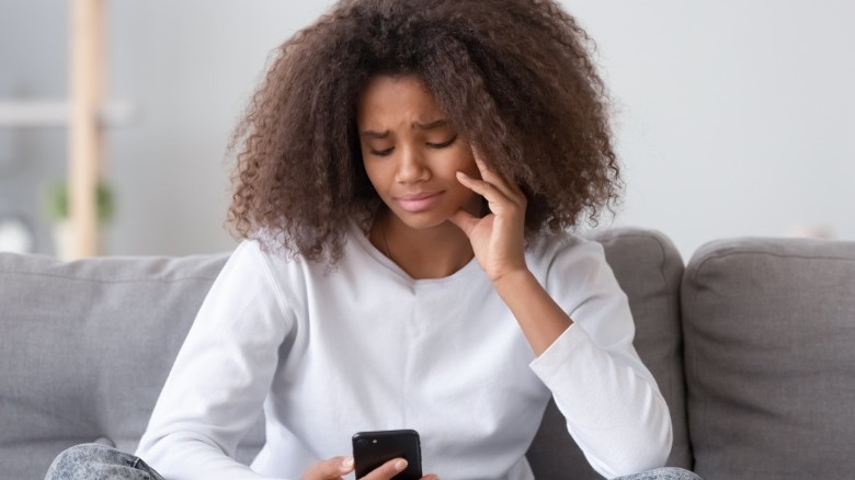 Woman looking at phone