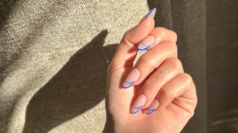 french manicure with blue outline