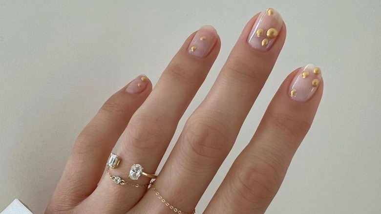 gold dots on nails