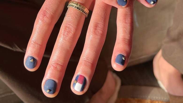 blue nail polish with jewels