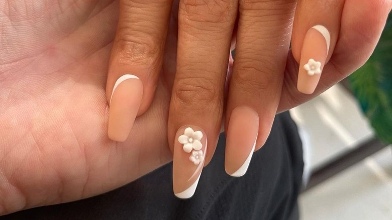 nude nails with white flowers