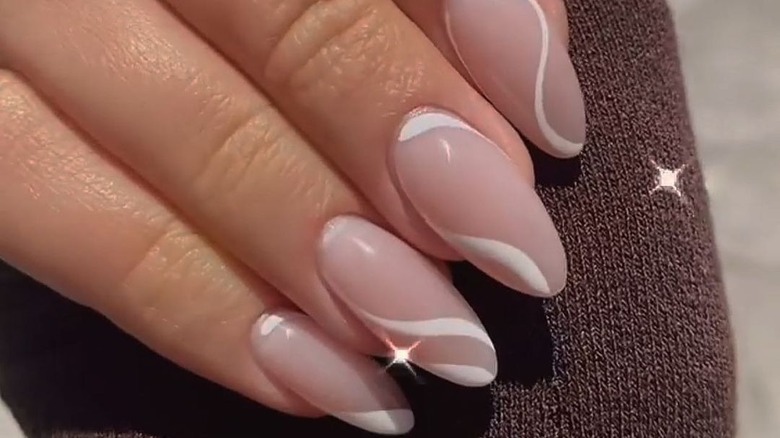 white swirl manicure