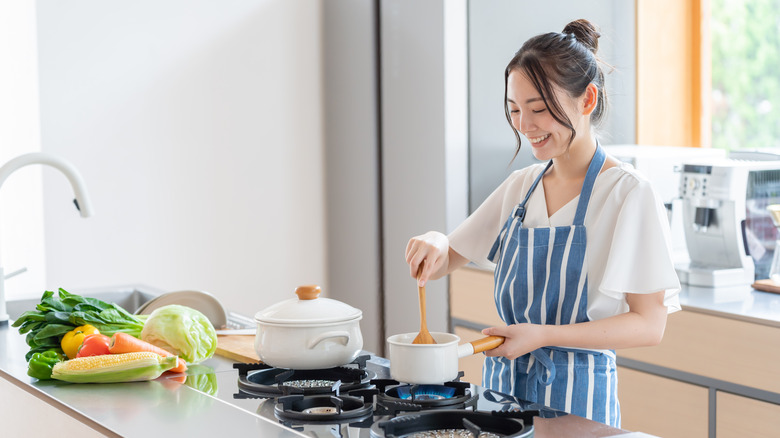 Woman cooking a meal