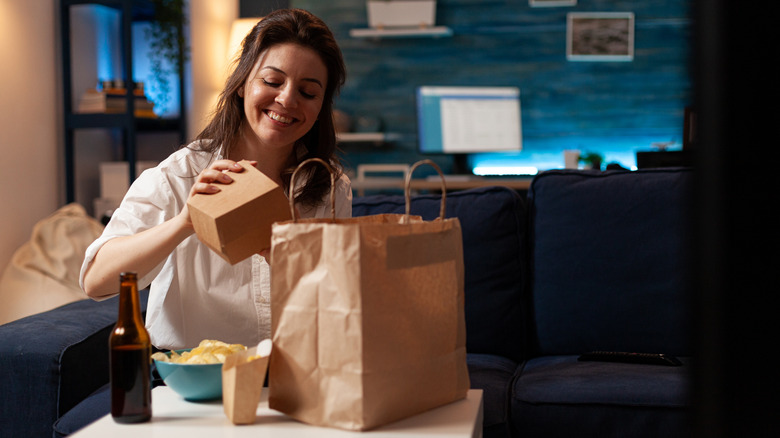 Woman unpacking her takeout