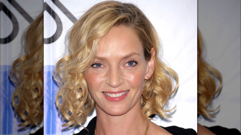 uma thurman with short curly bob