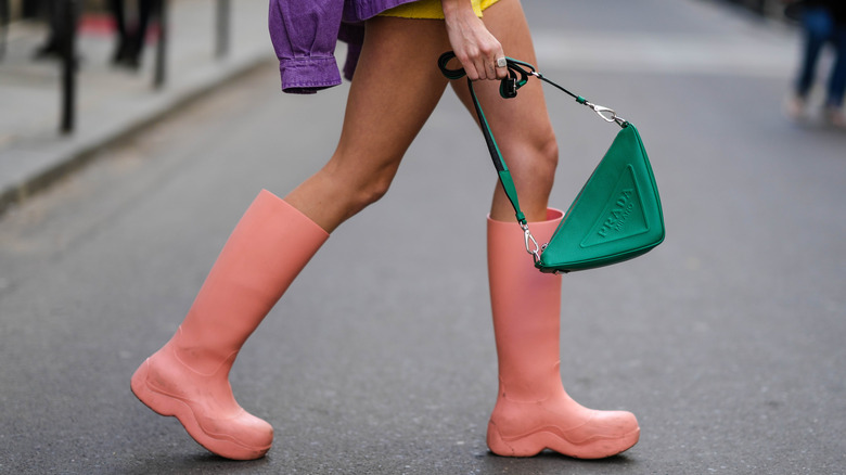 Close up of pink rain boots