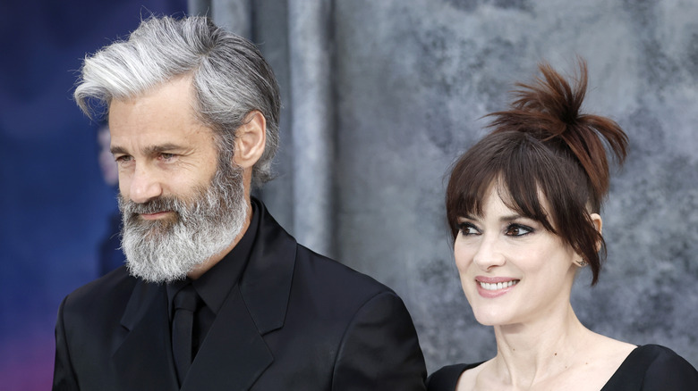 Winona Ryder and Scott Mackinlay Hahn on the red carpet.