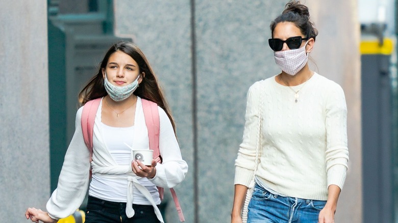 Suri Cruise Katie Holmes walking together