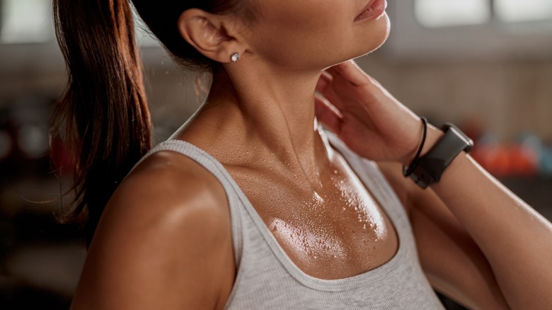 Woman sweating from workout