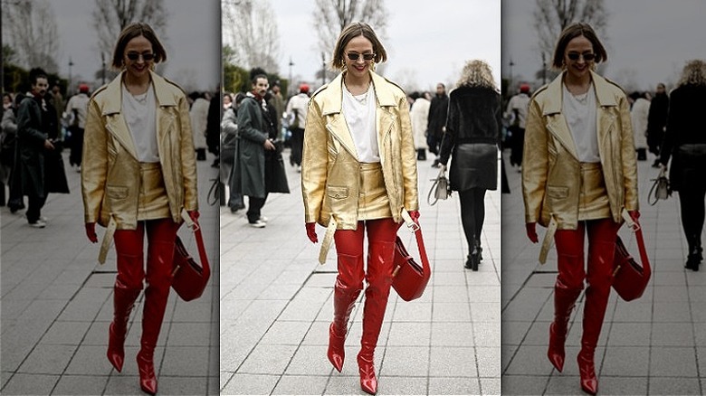 woman wearing leather thigh high boots