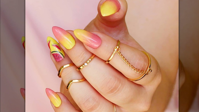 Pinkn and yellow ombre nails watermelon accent