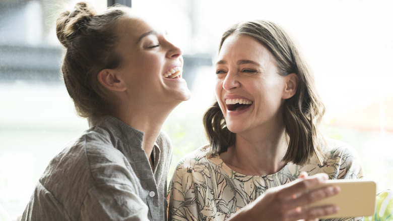 two friends laughing