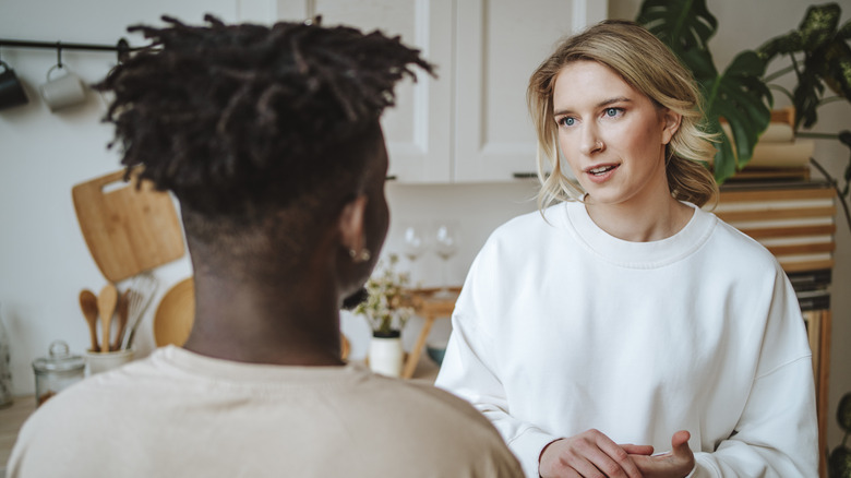 Couple having conversation at home