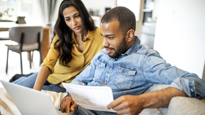 couple looking at laptop