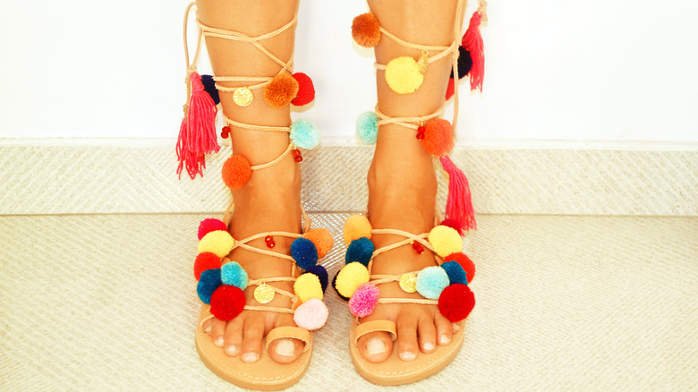 gladiator sandals with pom poms