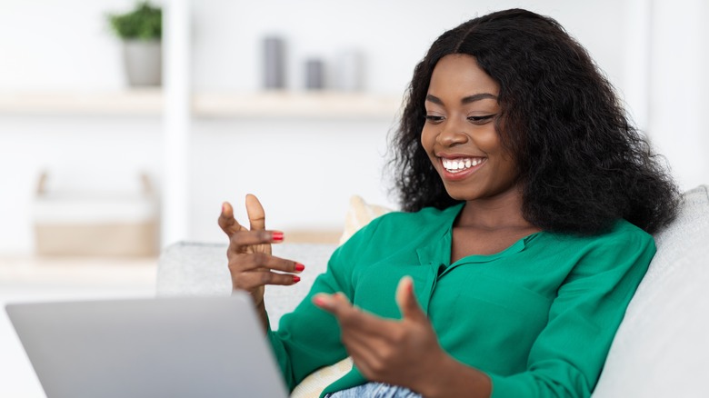 Woman on laptop chatting