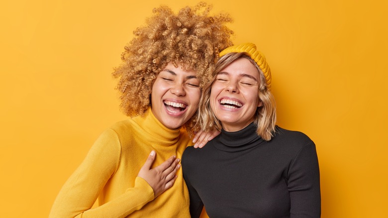 Two women laughing