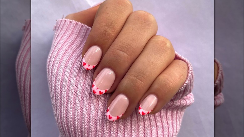 Red heart tip manicure