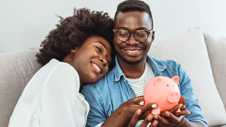 Black couple saving money together