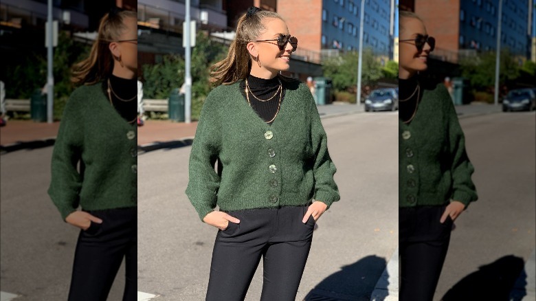 Girl wearing green hairy-knit sweater