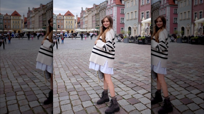 Woman wearing striped sweater