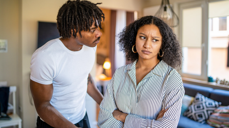 Couple argues in livingroom 