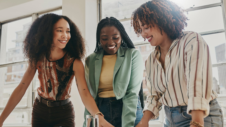 Three women working