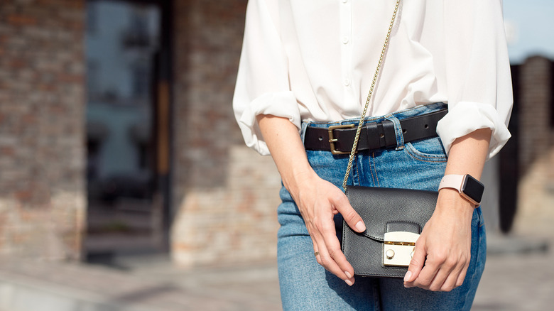 Black purse with jeans