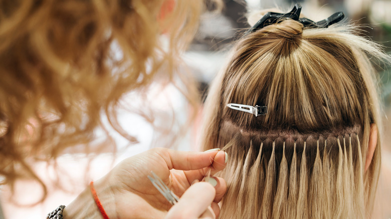 woman with beaded extensions 