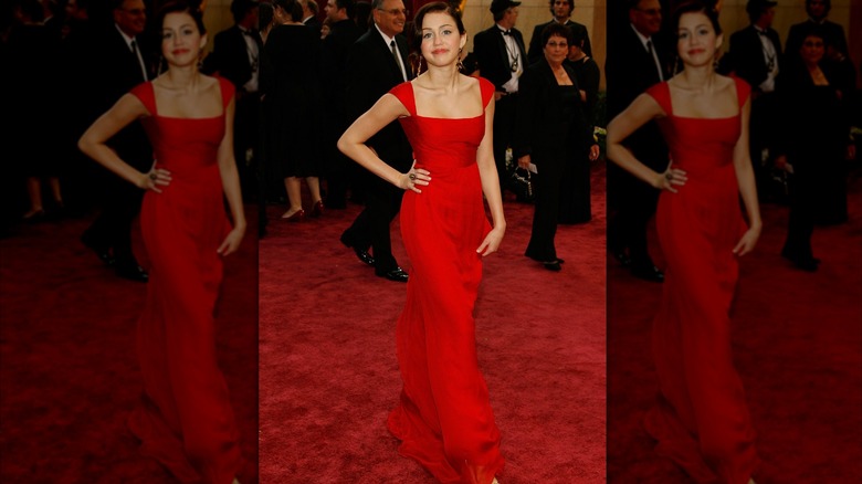 Miley Cyrus in a red gown at the 2008 Oscars