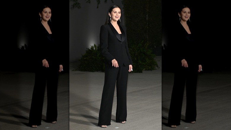 Selena Gomez wearing a black tuxedo at the 2022 Academy Museum Gala.